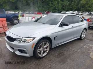 2016 BMW 4 Series 428i xDrive z VIN WBA4C9C57GG137858, wystawiony jako IAAI lot #42755021 z przebiegiem 92 728 mil mil oraz . Historia ofert i sprzedaży dostępna na DreamBid. Obrazek 19.