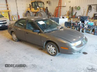 2001 Saturn SL z VIN 1G8ZH52841Z291352, wystawiony jako IAAI lot #41951058 z przebiegiem Nie podano mil oraz . Historia ofert i sprzedaży dostępna na DreamBid. Obrazek 1.