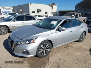 2021 Nissan Altima 2.5 SV with VIN 1N4BL4DV9MN340467, listed as a IAAI auction lot 41470877 with 61,678 mi miles. Bid and sale history available at carsss.com. Image 2.