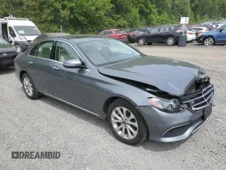 2018 Mercedes-Benz E 300 with VIN WDDZF4KBXJA337966, listed as a Copart auction lot 58718355 with 54,264 mi miles and Salvage title. Bid and sale history available at DreamBid. Image 4.