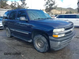 2005 Chevrolet Tahoe LT z VIN 1GNEC13T15R213638, wystawiony jako IAAI lot #41787524 z przebiegiem 153 709 mil mil oraz . Historia ofert i sprzedaży dostępna na DreamBid. Obrazek 1.