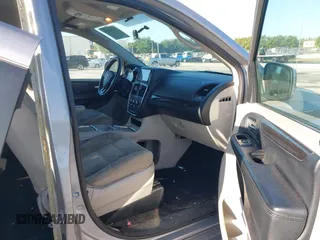 2015 Dodge Grand Caravan SXT with VIN 2C4RDGCG3FR592098, listed as a IAAI auction lot 42038665 with 104,092 mi miles and . Bid and sale history available at DreamBid. Image 5.