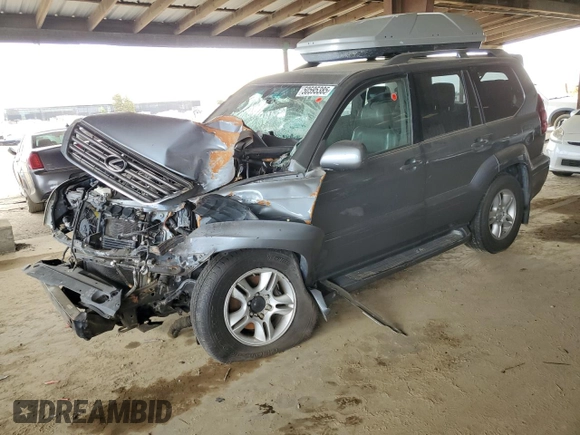2005 Lexus GX 470 with VIN JTJBT20XX50073695, listed as a Copart auction lot 50595385 with 162,617 mi miles and Salvage Title. Bid and sale history available at carsss.com. Image 1.