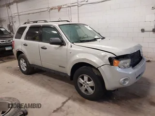 2008 Ford Escape XLT with VIN 1FMCU93128KC67338, listed as a IAAI auction lot 42099606 with 188,817 mi miles. Bid and sale history available at carsss.com. Image 1.
