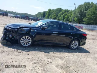 2017 Kia Optima EX with VIN 5XXGU4L36HG123828, listed as a IAAI auction lot 42059856 with 123,305 mi miles and . Bid and sale history available at DreamBid. Image 14.