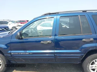 2002 Jeep Grand Cherokee Laredo with VIN 1J8GW48SX2C270339, listed as a IAAI auction lot 42390842 with Not provided miles and . Bid and sale history available at DreamBid. Image 13.