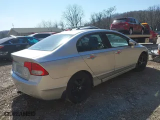 2010 Honda Civic Sdn EX with VIN 19XFA1F84AE035594, listed as a IAAI auction lot 41752445 with 173,264 mi miles. Bid and sale history available at carsss.com. Image 4.