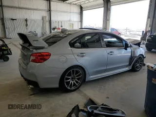2016 Subaru WRX Premium z VIN JF1VA1E69G9828081, wystawiony jako Copart lot #63122085 z przebiegiem 52 984 mil mil oraz Szkoda całkowita • Salvage title. Historia ofert i sprzedaży dostępna na DreamBid. Obrazek 3.