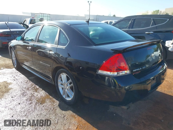 2012 Chevrolet Impala LTZ with VIN 2G1WC5E39C1280827, listed as a IAAI auction lot 41979470 with 153,669 mi miles and . Bid and sale history available at DreamBid. Image 3.