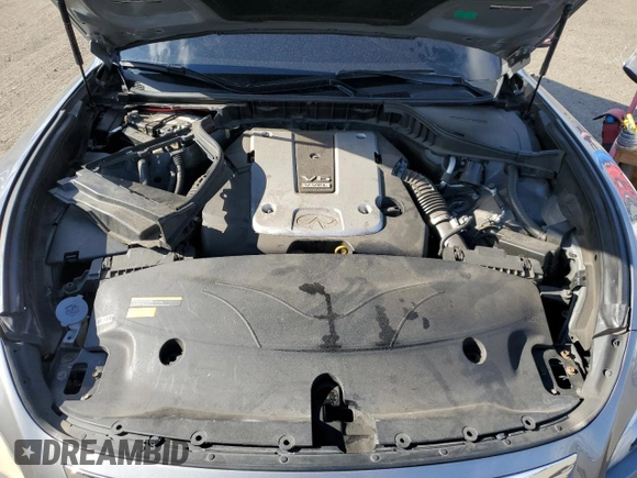 2013 Infiniti M z VIN JN1BY1AR3DM603904, wystawiony jako Copart lot #53673135 z przebiegiem 158 066 mil mil oraz Czysty tytuł • Clean title. Historia ofert i sprzedaży dostępna na DreamBid. Obrazek 11.