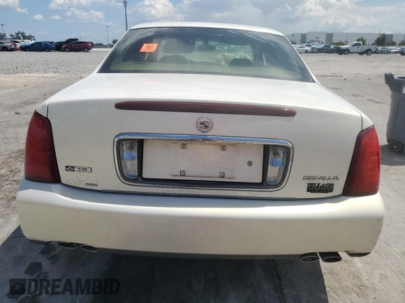 2004 Cadillac DeVille z VIN 1G6KD54Y44U226800, wystawiony jako Copart lot #61298895 z przebiegiem 108 211 mil mil oraz Szkoda całkowita • Salvage title. Historia ofert i sprzedaży dostępna na DreamBid. Obrazek 6.