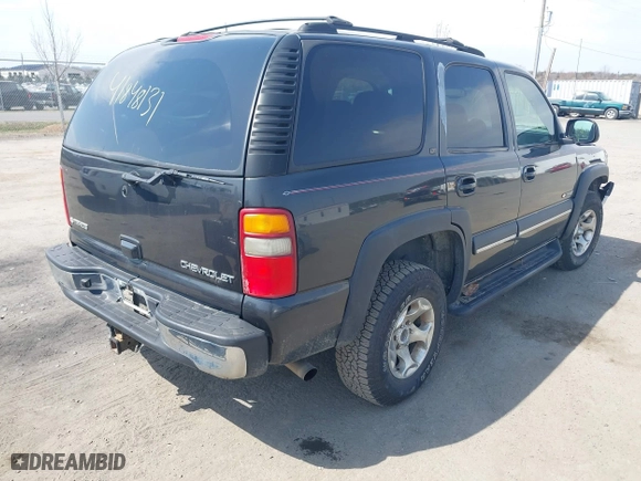 2003 Chevrolet Tahoe Z71 with VIN 1GNEK13Z13R166468, listed as a IAAI auction lot 41848131 with 163,738 mi miles. Bid and sale history available at carsss.com. Image 4.