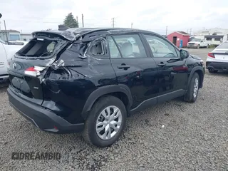 2023 Toyota Corolla Cross L with VIN 7MUAAABG3PV049367, listed as a IAAI auction lot 42370328 with 15,207 mi miles and . Bid and sale history available at DreamBid. Image 4.