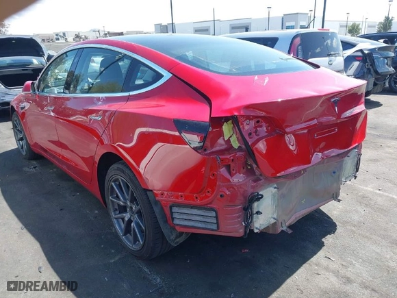 2018 Tesla Model 3 Long Range Battery with VIN 5YJ3E1EA3JF024639, listed as a IAAI auction lot 41866084 with 57,525 mi miles. Bid and sale history available at carsss.com. Image 3.
