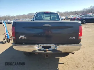 1998 Ford F-150 with VIN 1FTRF18L7WNA73159, listed as a Copart auction lot 48682685 with 71,261 mi miles and Salvage title. Bid and sale history available at DreamBid. Image 6.