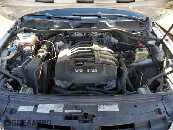 2012 Volkswagen Touareg Exec with VIN WVGEF9BP1CD010015, listed as a Copart auction lot 72646154 with 163,502 mi miles and Salvage Title. Bid and sale history available at DreamBid. Image 12.