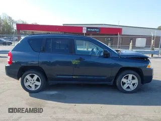 2008 Jeep Compass Sport with VIN 1J8FF47W68D758903, listed as a IAAI auction lot 41904401 with 154,016 mi miles. Bid and sale history available at carsss.com. Image 14.