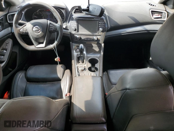 2018 Nissan Maxima SV z VIN 1N4AA6AP2JC379217, wystawiony jako Copart lot #64887215 z przebiegiem 153 063 mil mil oraz Szkoda całkowita • Salvage title. Historia ofert i sprzedaży dostępna na DreamBid. Obrazek 8.