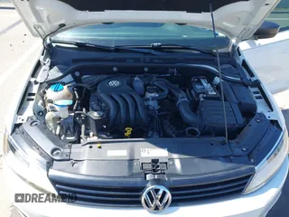 2014 Volkswagen Jetta S z VIN 3VW2K7AJ4EM415553, wystawiony jako IAAI lot #41971067 z przebiegiem 143 235 mil mil oraz . Historia ofert i sprzedaży dostępna na DreamBid. Obrazek 10.