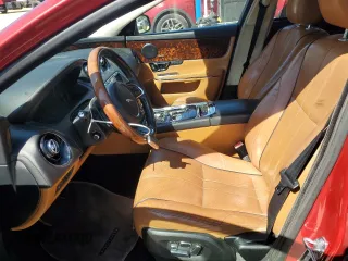2015 Jaguar XJ Portfolio z VIN SAJWJ2GD9F8V90013, wystawiony jako Copart lot #49766095 z przebiegiem 179 970 mil mil oraz Czysty tytuł • Clean title. Historia ofert i sprzedaży dostępna na DreamBid. Obrazek 7.
