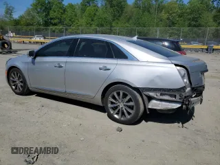 2013 Cadillac XTS Luxury с VIN 2G61P5S3XD9189744, выставлен на аукционе Copart как лот 54391535 с пробегом 132 841 миль миль и Списание • Salvage title. История ставок и продаж доступна на DreamBid. Изображение 2.