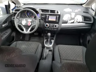 2017 Honda Fit LX with VIN 3HGGK5H55HM703996, listed as a Copart auction lot 61653735 with 77,028 mi miles and Salvage title. Bid and sale history available at DreamBid. Image 8.