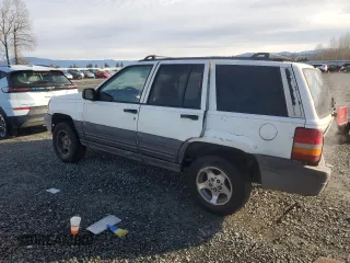 1996 Jeep Grand Cherokee Laredo with VIN 1J4EX58S3TC110154, listed as a Copart auction lot 46947805 with 268,507 mi miles and Salvage Title. Bid and sale history available at carsss.com. Image 2.