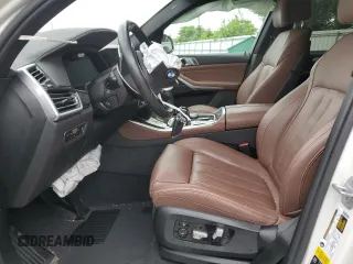 2020 BMW X5 xDrive40i with VIN 5UXCR6C06L9B11252, listed as a Copart auction lot 59634655 with Not provided miles and Salvage title. Bid and sale history available at DreamBid. Image 7.