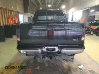 1999 Ford F-250 XL z VIN 1FTNX21F9XEB44305, wystawiony jako Copart lot #57709325 z przebiegiem 322 402 mil mil oraz Czysty tytuł • Clean title. Historia ofert i sprzedaży dostępna na DreamBid. Obrazek 6.