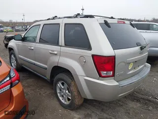2007 Jeep Grand Cherokee Laredo with VIN 1J8GR48K17C537088, listed as a IAAI auction lot 41845987 with 143,661 mi miles. Bid and sale history available at carsss.com. Image 3.