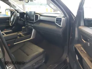 2023 Toyota Tundra Limited with VIN 5TFJA5DB9PX125400, listed as a IAAI auction lot 41336129 with 12,384 mi miles and . Bid and sale history available at DreamBid. Image 5.