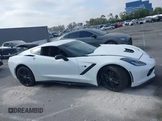 2014 Chevrolet Corvette 1LT z VIN 1G1YB2D72E5123317, wystawiony jako IAAI lot #42403964 z przebiegiem 36 113 mil mil oraz . Historia ofert i sprzedaży dostępna na DreamBid. Obrazek 13.