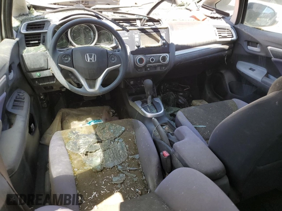 2016 Honda Fit LX z VIN JHMGK5H59GX027526, wystawiony jako Copart lot #57831785 z przebiegiem Nie podano mil oraz Szkoda całkowita • Salvage title. Historia ofert i sprzedaży dostępna na DreamBid. Obrazek 8.