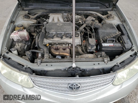 2002 Toyota Solara SE z VIN 2T1CF22P92C600803, wystawiony jako Copart lot #44815385 z przebiegiem 111 046 mil mil oraz Szkoda całkowita • Salvage title. Historia ofert i sprzedaży dostępna na DreamBid. Obrazek 11.