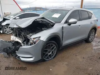 2018 Mazda CX-5 Grand Touring с VIN JM3KFBDM8J0326492, выставлен на аукционе IAAI как лот 40928841 с пробегом 114 848 миль миль и . История ставок и продаж доступна на DreamBid. Изображение 18.