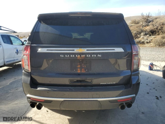 2023 Chevrolet Suburban Premier with VIN 1GNSCFKD5PR394675, listed as a Copart auction lot 49641395 with 56,946 mi miles and Salvage Title. Bid and sale history available at carsss.com. Image 6.
