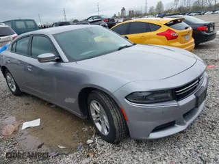 2015 Dodge Charger SE with VIN 2C3CDXBGXFH856726, listed as a IAAI auction lot 41923443 with 150,678 mi miles. Bid and sale history available at carsss.com. Image 1.