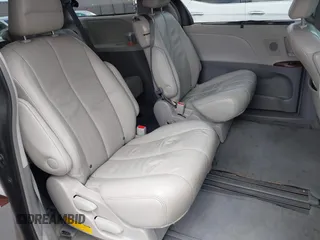 2014 Toyota Sienna XLE with VIN 5TDYK3DC7ES517206, listed as a IAAI auction lot 41945572 with 128,743 mi miles and . Bid and sale history available at DreamBid. Image 8.
