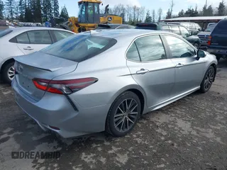 2023 Toyota Camry SE with VIN 4T1G11AK3PU810657, listed as a IAAI auction lot 41957968 with 38,297 mi miles. Bid and sale history available at carsss.com. Image 4.