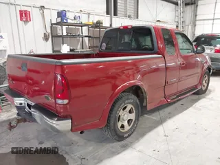2002 Ford F-150 XL with VIN 1FTRX17L12NA36715, listed as a IAAI auction lot 41850555 with 174,012 mi miles. Bid and sale history available at carsss.com. Image 4.