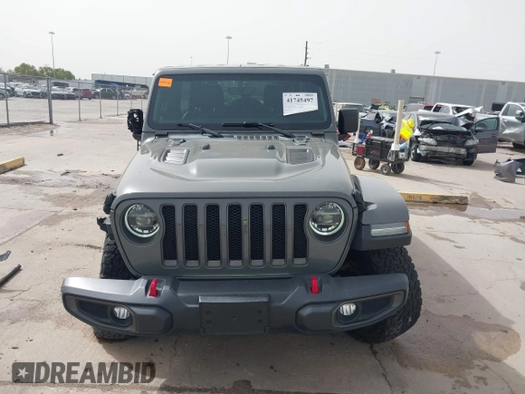 2020 Jeep Wrangler Unlimited Rubicon z VIN 1C4HJXFG2LW267154, wystawiony jako IAAI lot #41745497 z przebiegiem 28 692 mil mil oraz . Historia ofert i sprzedaży dostępna na DreamBid. Obrazek 13.
