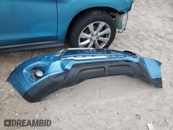 2014 Mitsubishi Outlander SE z VIN 4A4AP4AU2EE020696, wystawiony jako Copart lot #59438435 z przebiegiem Nie podano mil oraz Szkoda całkowita • Salvage title. Historia ofert i sprzedaży dostępna na DreamBid. Obrazek 13.