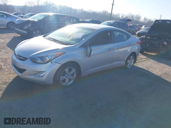 2012 Hyundai Elantra Limited with VIN KMHDH4AE9CU304965, listed as a IAAI auction lot 41752391 with 77,489 mi miles. Bid and sale history available at carsss.com. Image 2.