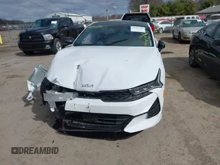 2024 Kia K5 GT-Line z VIN 5XXG64J27RG263411, wystawiony jako IAAI lot #41968914 z przebiegiem 23 238 mil mil oraz . Historia ofert i sprzedaży dostępna na DreamBid. Obrazek 12.
