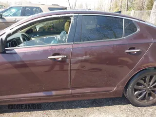 2014 Kia Optima EX with VIN 5XXGN4A70EG266191, listed as a IAAI auction lot 41895612 with 229,472 mi miles and . Bid and sale history available at carsss.com. Image 15.
