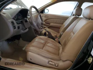 1999 Nissan Maxima GXE z VIN JN1CA21D0XT808755, wystawiony jako Copart lot #49693685 z przebiegiem 63 389 mil mil oraz Szkoda całkowita • Salvage title. Historia ofert i sprzedaży dostępna na DreamBid. Obrazek 7.
