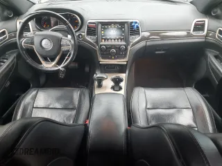 2014 Jeep Grand Cherokee Overland with VIN 1C4RJFCG1EC587458, listed as a Copart auction lot 50213015 with 124,266 mi miles and Salvage Title. Bid and sale history available at carsss.com. Image 8.