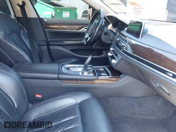 2020 BMW 7 Series 740i xDrive with VIN WBA7T4C03LGF97293, listed as a IAAI auction lot 40189953 with 64,936 mi miles and . Bid and sale history available at DreamBid. Image 5.