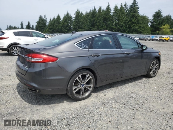 2017 Ford Fusion Titanium z VIN 3FA6P0K95HR139060, wystawiony jako Copart lot #62200755 z przebiegiem 106 133 mil mil oraz Szkoda całkowita • Salvage title. Historia ofert i sprzedaży dostępna na DreamBid. Obrazek 3.