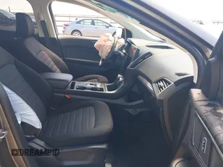 2024 Ford Edge SE z VIN 2FMPK4G99RBB18608, wystawiony jako IAAI lot #42430244 z przebiegiem Nie podano mil oraz . Historia ofert i sprzedaży dostępna na DreamBid. Obrazek 5.